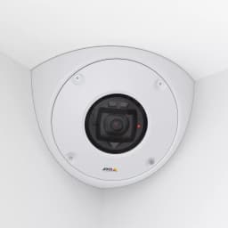 AXIS Q9216-SLV from AXIS COMMUNICATIONS - white, mounted in a corner with white walls